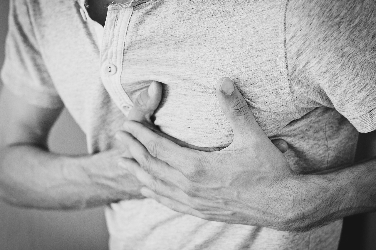 man_holding_chest_with_two_hands